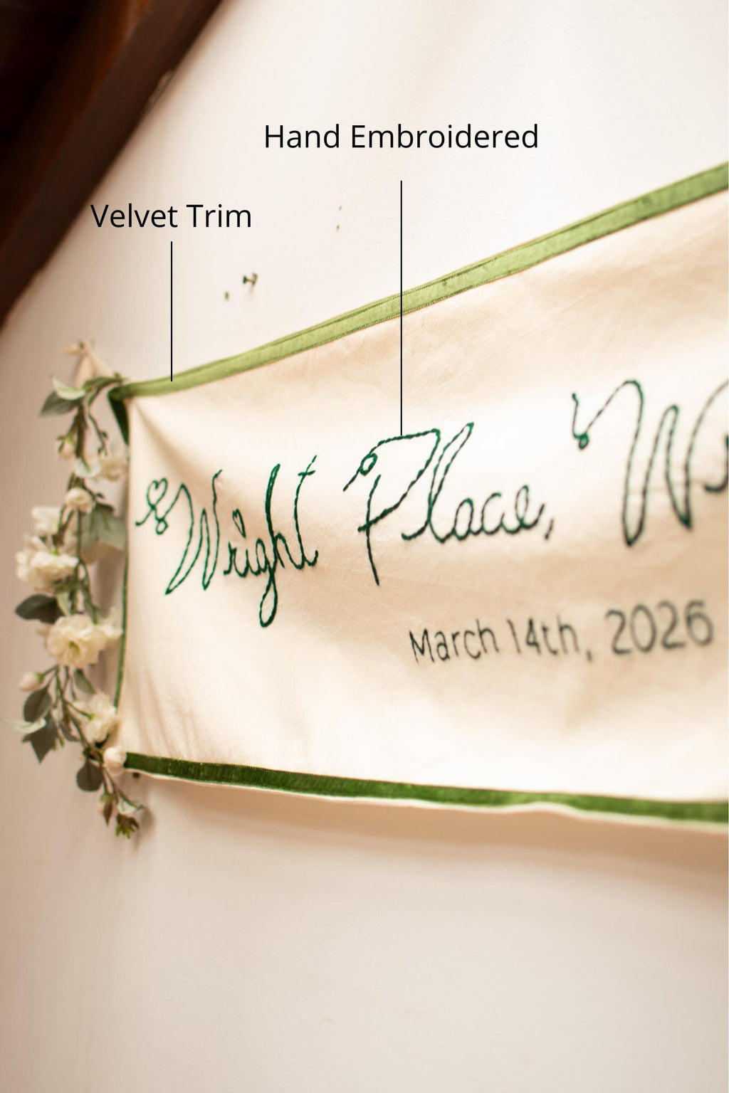 Hand embroidered banner with 'Wight Place' and date, featuring velvet trim and floral elements.